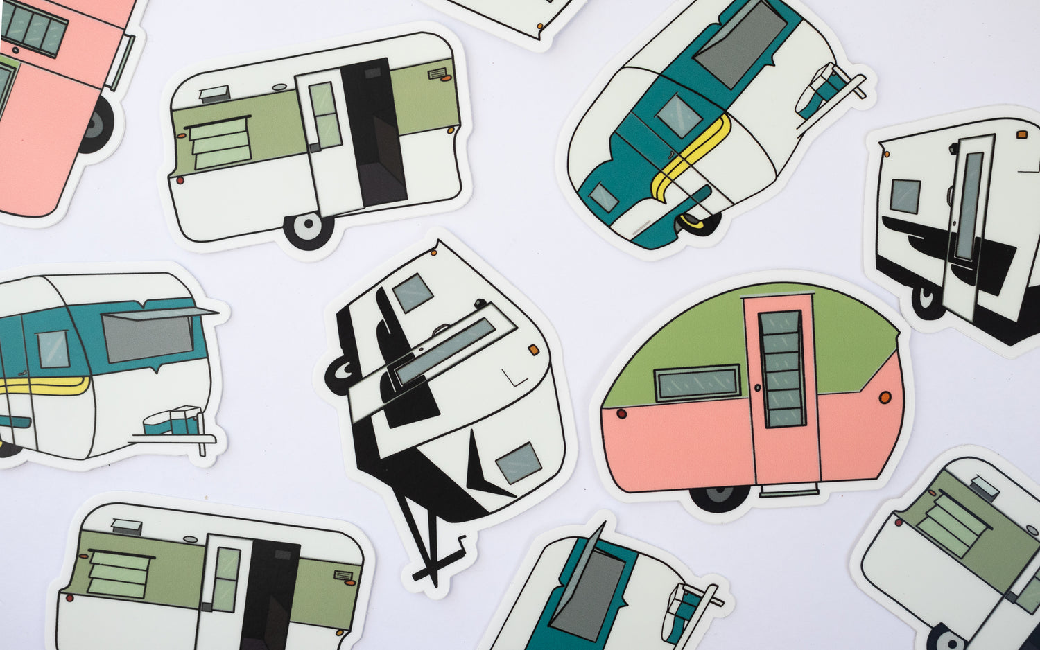 Image of 4 different colorful vintage trailers all laid out, in a fun design